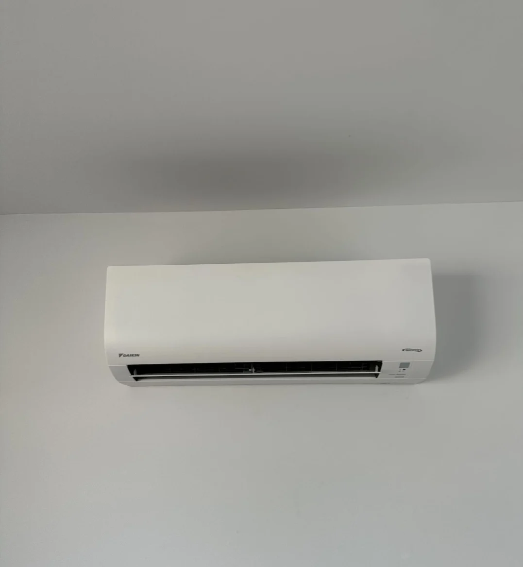 Wall-mounted split-system air conditioner installed by Electrified